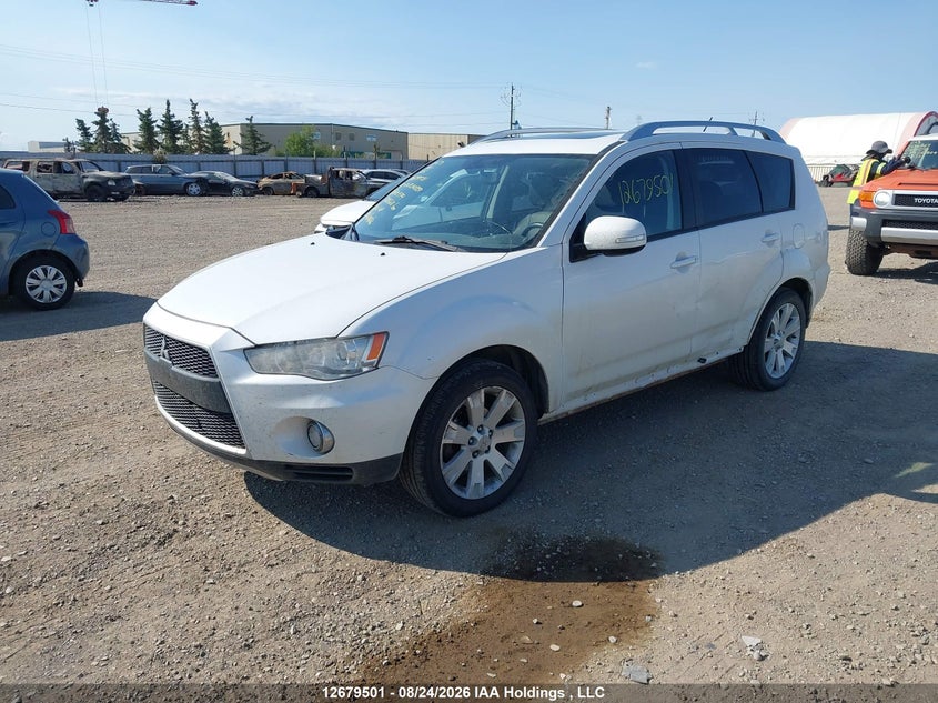 2010 Mitsubishi Outlander, Левый бок, IAAI, VIN JA4JT5AX6AZ600579 — фото 2