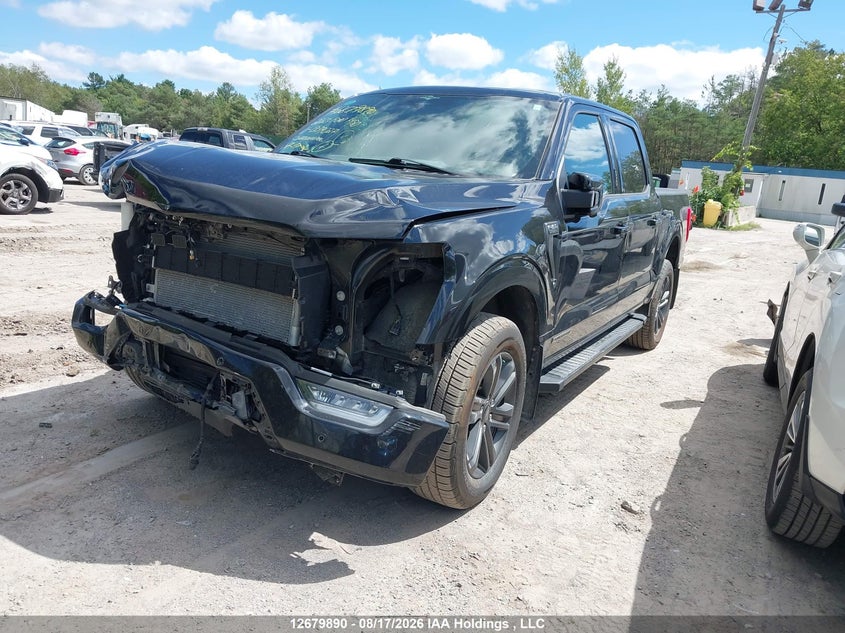 2023 Ford F-150 Lariat, Front, IAAI, VIN 1FTFW1ED9PFB39027 — photo 2