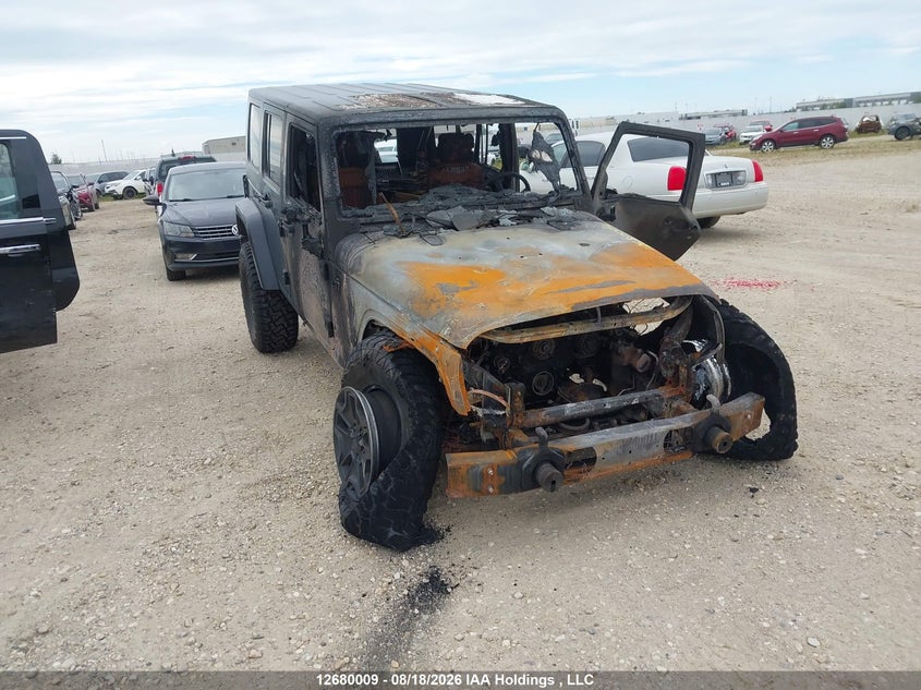 2009 Jeep Wrangler Unlimited Sahara, Total Burn, IAAI, VIN 1J8GA59109L744951