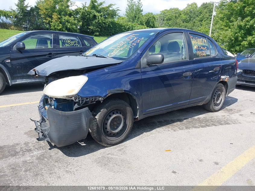 2003 Toyota Echo, Right Front, IAAI, VIN JTDBT123435038643 — photo 2