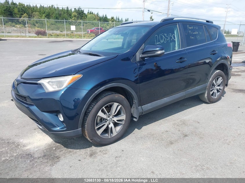 2018 Toyota RAV 4, Удар спереди, IAAI, VIN 2T3RFREV6JW783028 — фото 2