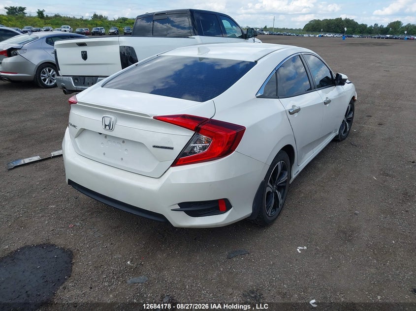 Vin: 2hgfc1f92jh106929, lot: 3088510, honda civic touring 20184