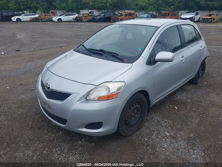 2009 Toyota Yaris, Удар сзади, IAAI, VIN JTDBT923491347897 — фото 2