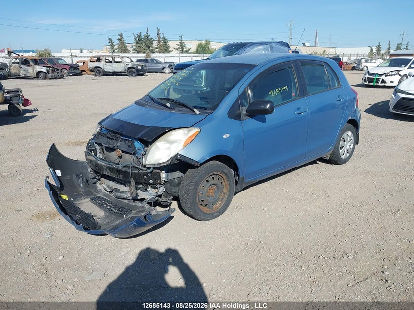 2007 Toyota Yaris Le/Rs, Удар спереди, IAAI, VIN JTDKT923X75112023 — фото 2