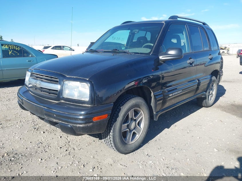2003 Chevrolet Tracker, Charity, IAAI, VIN 2CNBJ13C936947241 — photo 2