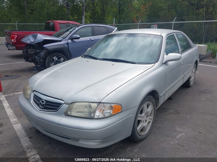 2001 Mazda 626, Charity, IAAI, VIN 1YVGF22D815229470 — photo 2