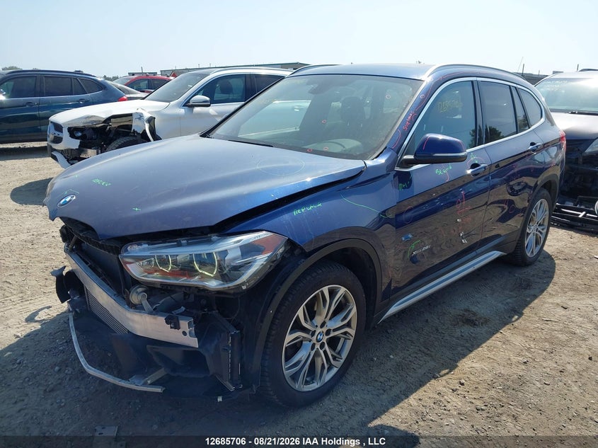 2017 BMW X1, Front, IAAI, VIN WBXHT3C31H5F81059 — photo 2