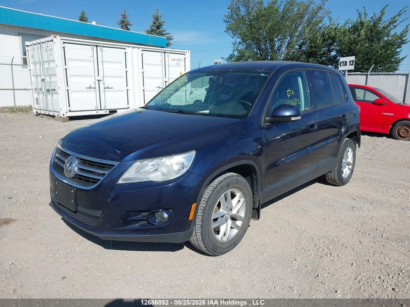 2011 Volkswagen Tiguan S/Se/Sel, Rear, IAAI, VIN WVGBV7AX0BW547070 — photo 2