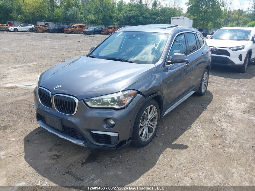 2017 BMW X1, Удар спереду, IAAI, VIN WBXHT3C39H5F72531 — фото 2