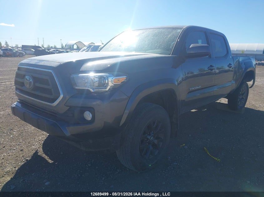 2022 Toyota Tacoma, Rear, IAAI, VIN 3TYDZ5BN2NT009787 — photo 2