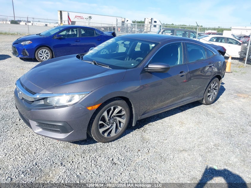 2016 Honda Civic, Удар сзади, IAAI, VIN 2HGFC2F74GH022317 — фото 2
