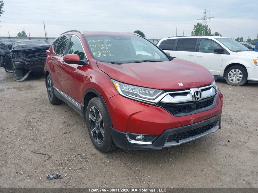 Vin: 2hkrw2h91jh103811, lot: 3094482, honda cr-v touring 2018 img_1