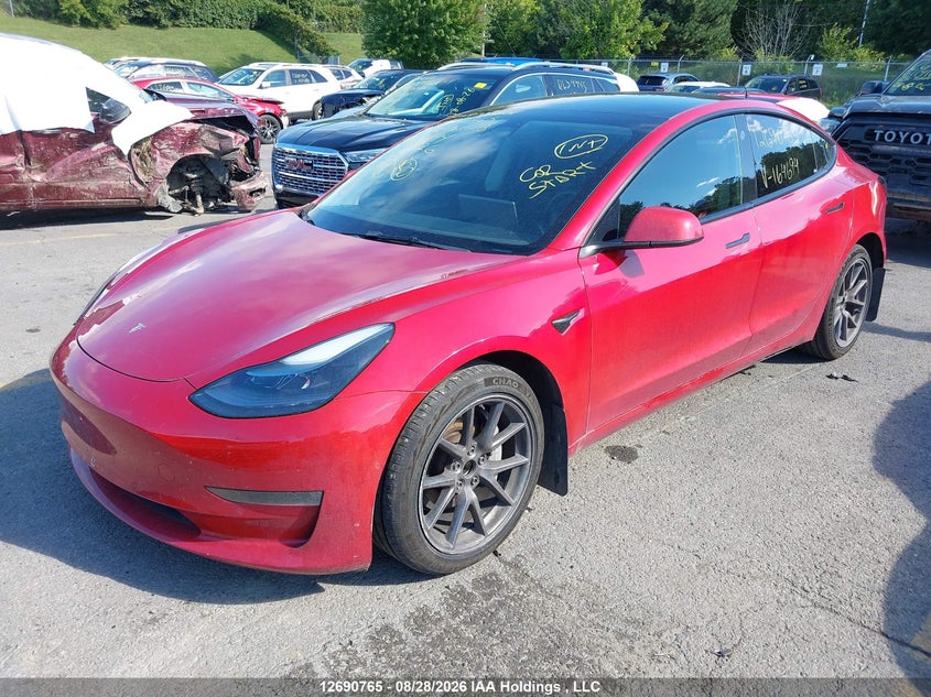 2022 Tesla Model 3, Right Front, IAAI, VIN 5YJ3E1EA1NF164694 — photo 2