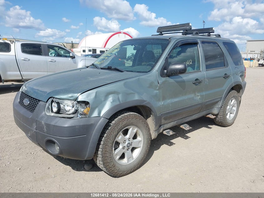 2005 Ford Escape, Left Front, IAAI, VIN 1FMYU93165KA85952 — photo 2