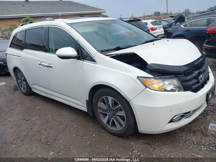 2014 Honda Odyssey Touring, Удар спереди, IAAI, VIN 5FNRL5H94EB505692