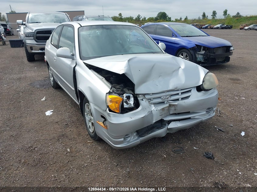 2003 Hyundai Accent, Удар спереди, IAAI, VIN KMHCG35GX3U250774