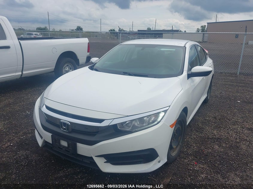 2017 Honda Civic, Rear, IAAI, VIN 2HGFC2F59HH011779 — photo 2