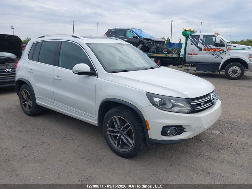 Vin: wvgjv7ax2fw065475, lot: 3106131, volkswagen tiguan 2015 img_1