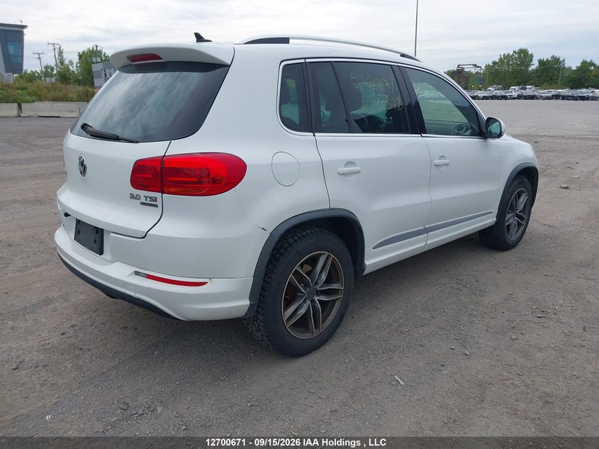 Vin: wvgjv7ax2fw065475, lot: 3106131, volkswagen tiguan 20154