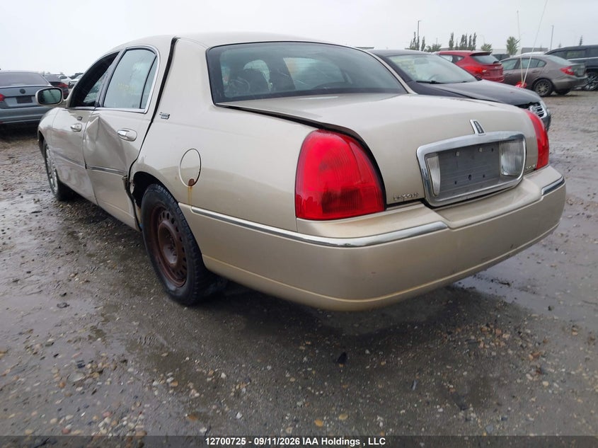 Vin: 2lnbl8cv7ax623815, lot: 3106185, lincoln town car 20103