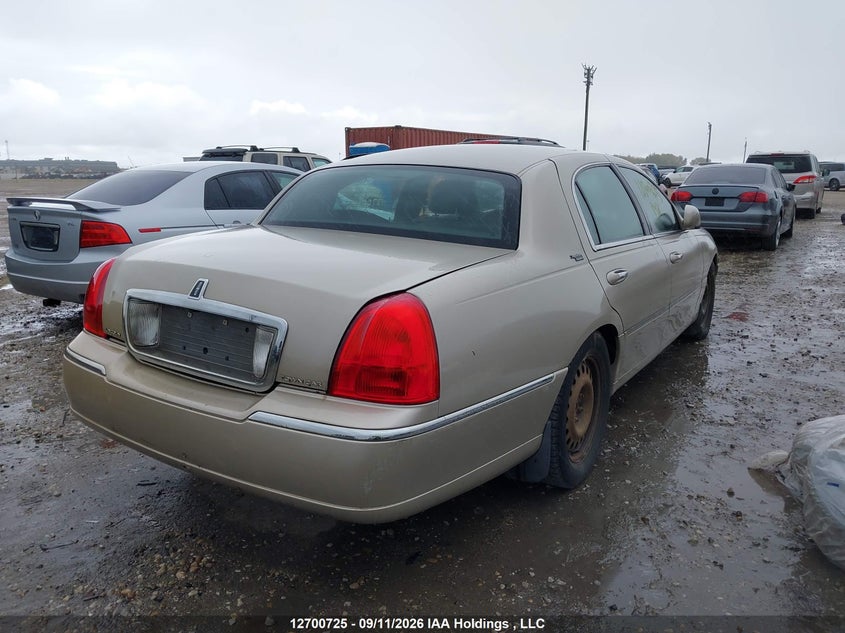 Vin: 2lnbl8cv7ax623815, lot: 3106185, lincoln town car 20104