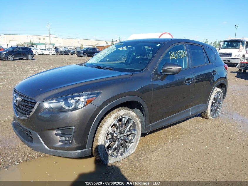 2016 Mazda —, Hail, IAAI, VIN JM3KE4DY1G0888650 — photo 2