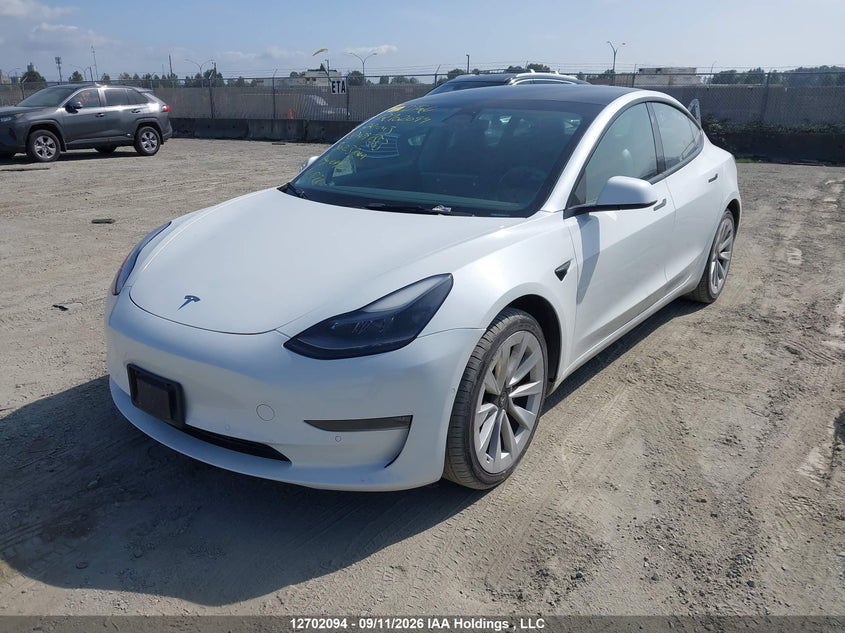 2022 Tesla Model 3, Interior Damage, IAAI, VIN 5YJ3E1EB9NF297583 — photo 2