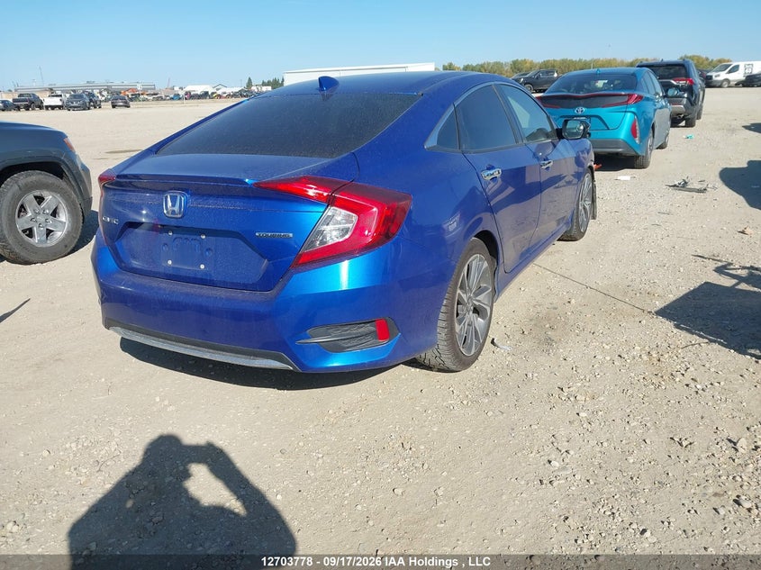 Vin: 2hgfc1f97kh103669, lot: 3109467, honda civic touring 20194