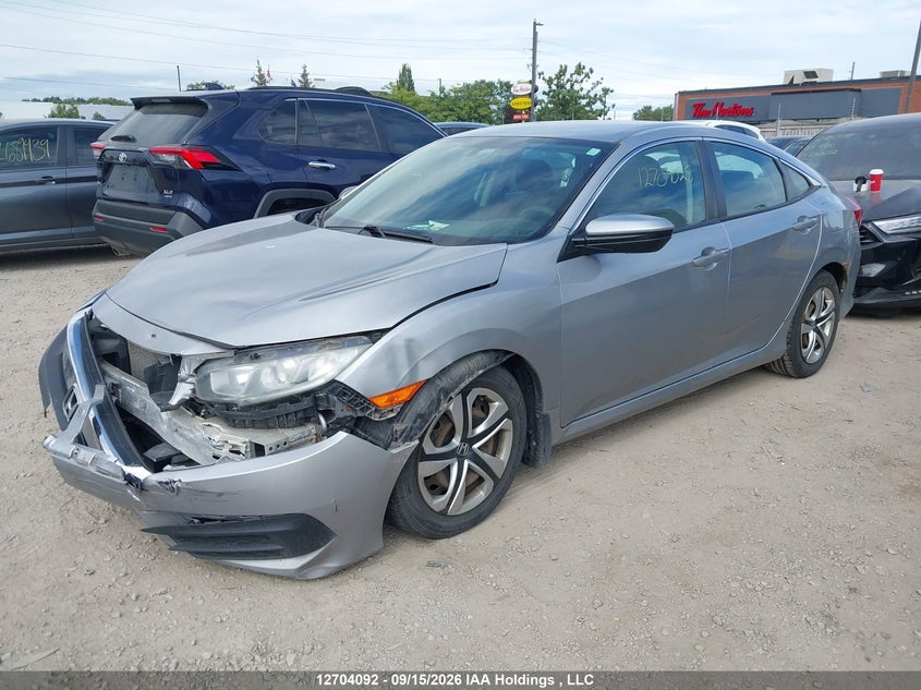 Vin: 2hgfc2f59gh014728, lot: 3109791, honda civic lx 20162