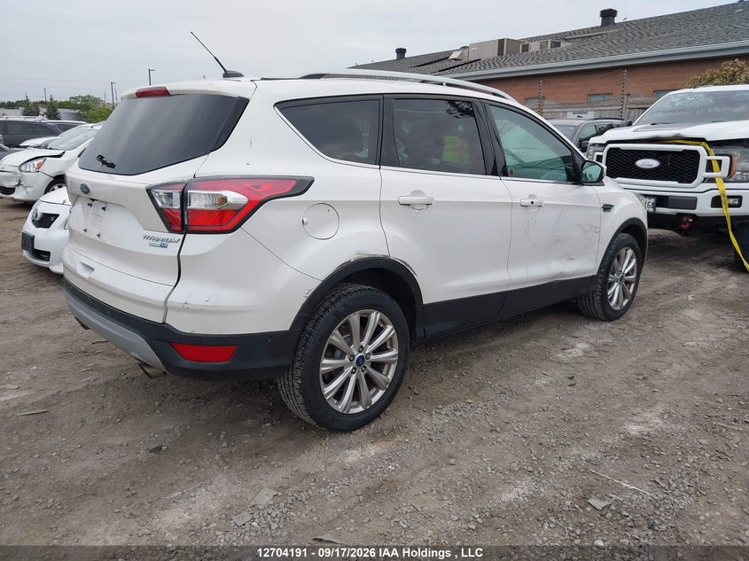 Vin: 1fmcu9j93hua70014, lot: 3109900, ford escape titanium 20174