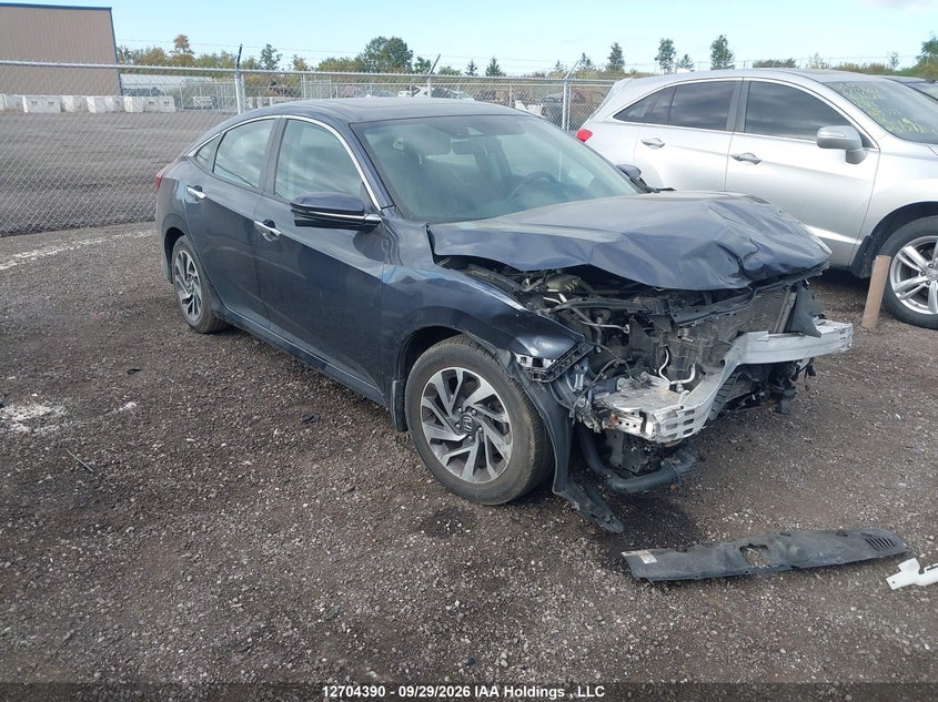 Vin: 2hgfc1f90lh103448, lot: 3110123, honda civic touring 2020 img_1