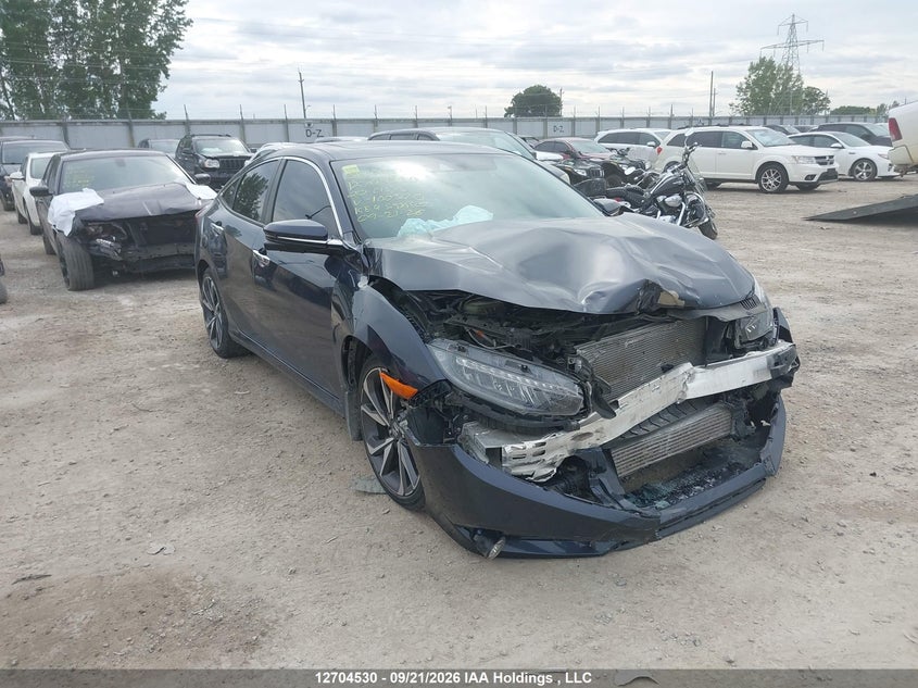 Vin: 2hgfc1f97lh100370, lot: 3110279, honda civic touring 2020 img_1