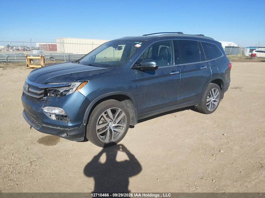 2017 Honda Pilot Touring, Удар спереди, IAAI, VIN 5FNYF6H92HB505784 — фото 2