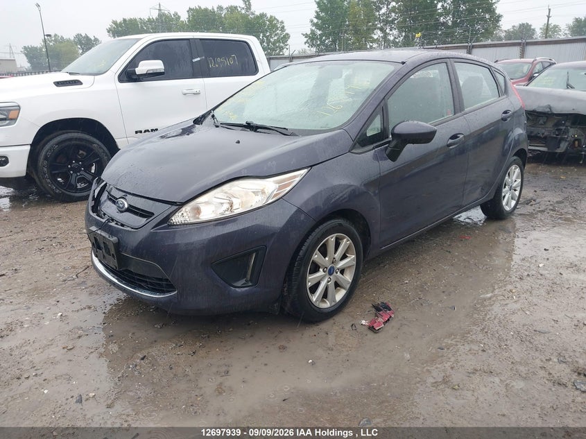 2012 Ford Fiesta, Удар спереду, IAAI, VIN 3FADP4EJ6CM181649 — фото 2