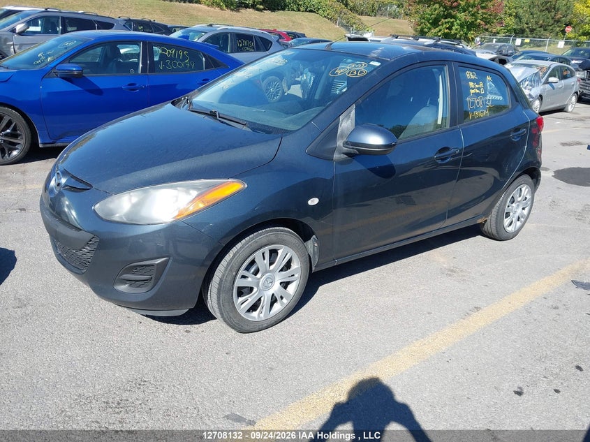 2012 Mazda 2, Левый зад, IAAI, VIN JM1DE1KY3C0131634 — фото 2