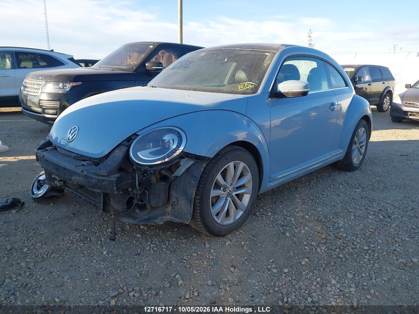 2015 Volkswagen The Beetle 2.0 Tdi Comfortline, Удар спереди, IAAI, VIN 3VWRA7AT8FM643379 — фото 2