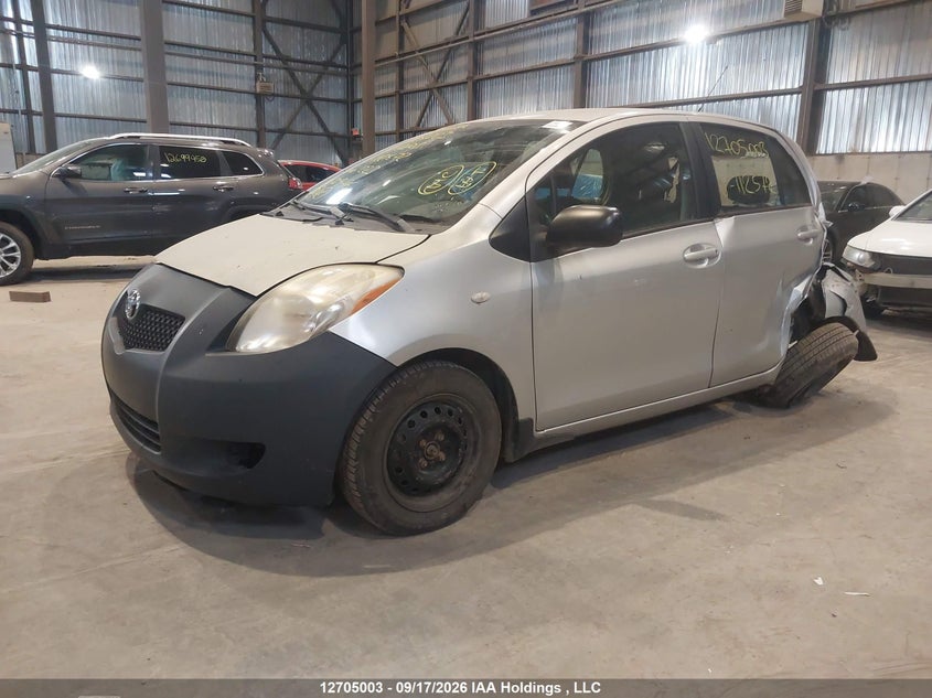 2007 Toyota Yaris Le/Rs, Left Rear, IAAI, VIN JTDKT923X75112572 — photo 2