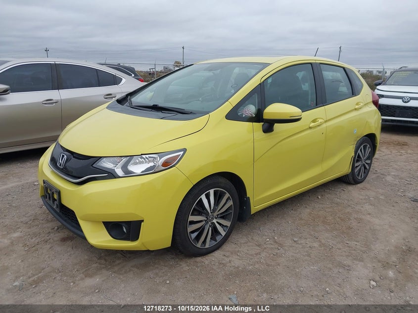 2015 Honda Fit Ex/Ex-L Navi, Левый зад, IAAI, VIN 3HGGK5H8XFM107404 — фото 2
