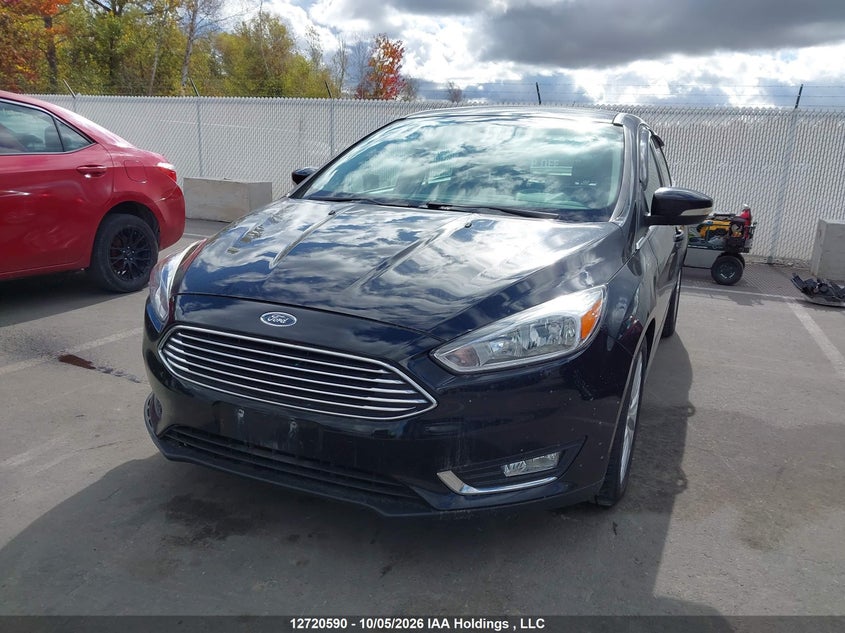 2017 Ford Focus Titanium, Right Front, IAAI, VIN 1FADP3J22HL320922 — photo 2