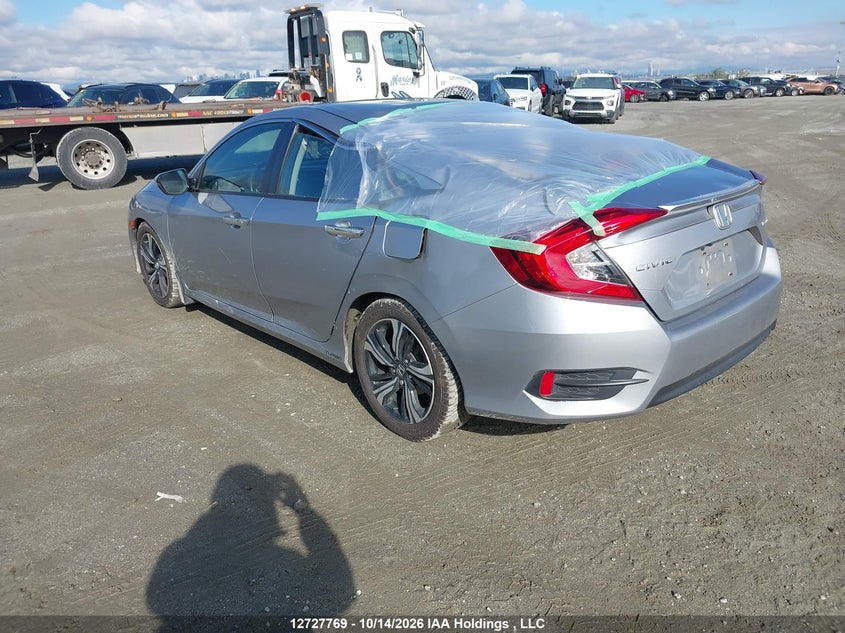 Vin: 2hgfc1f99hh109482, lot: 3135380, honda civic touring 20173