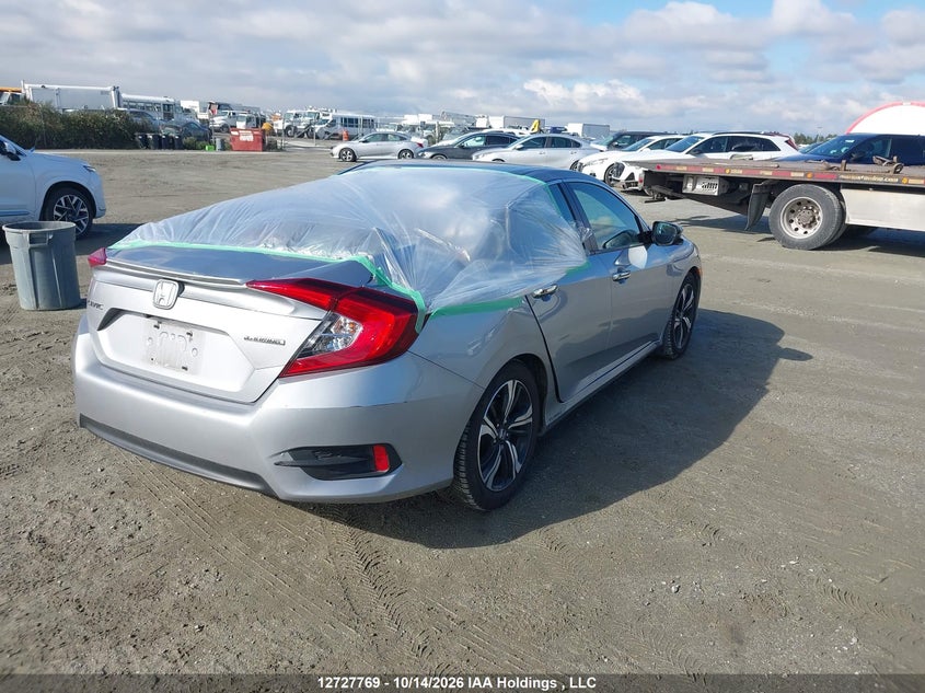 Vin: 2hgfc1f99hh109482, lot: 3135380, honda civic touring 20174