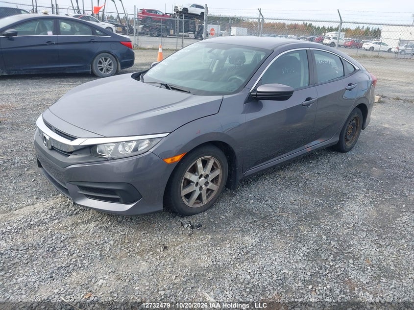 Vin: 2hgfc2f59jh007821, lot: 3140404, honda civic sedan lx 20182