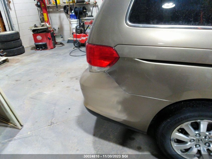 2010 Honda Odyssey Exl VIN: 5FNRL3H69AB507233 Lot: 30024810