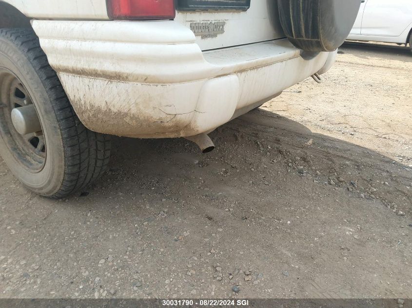 2003 Chevrolet Tracker VIN: 2CNBJ13CX36942176 Lot: 30031790