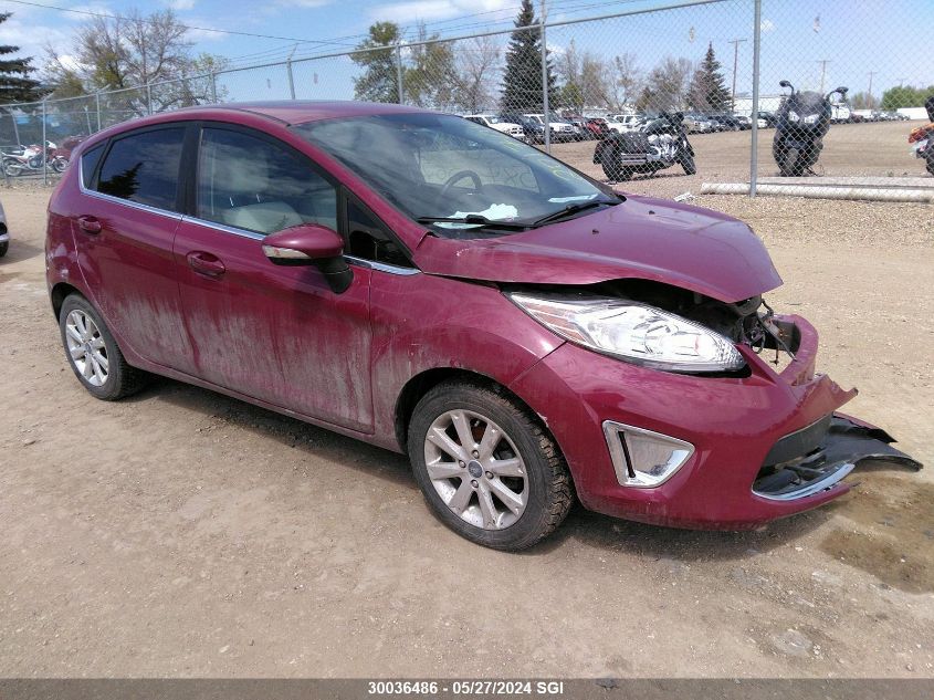 2011 Ford Fiesta Ses VIN: 3FADP4FJ6BM201704 Lot: 30036486