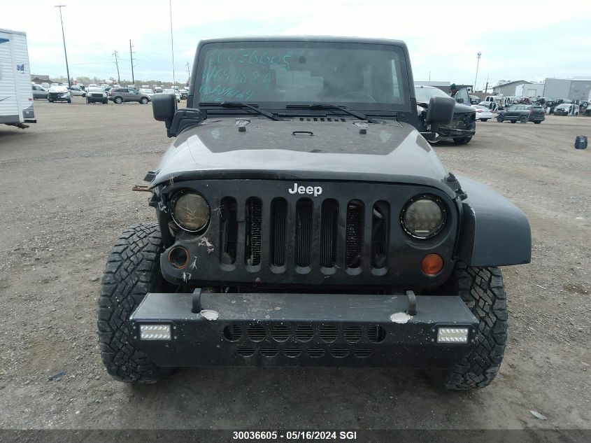 2008 Jeep Wrangler Unlimited Sahara VIN: 1J4GA59138L644584 Lot: 30036605