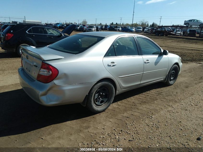 2003 Toyota Camry Le/Xle VIN: JTDBE32K930144614 Lot: 30036958