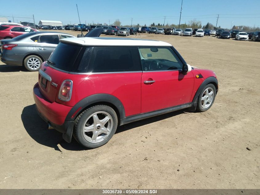 2009 Mini Cooper VIN: WMWMF335X9TW70169 Lot: 30036739