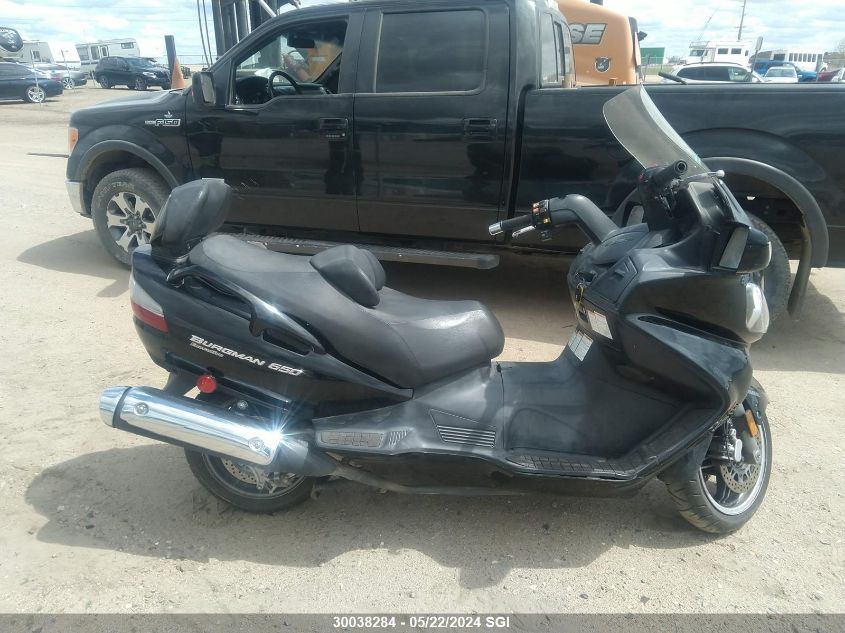 2010 Suzuki An650 A VIN: JS1CP51B9A2100037 Lot: 30038284