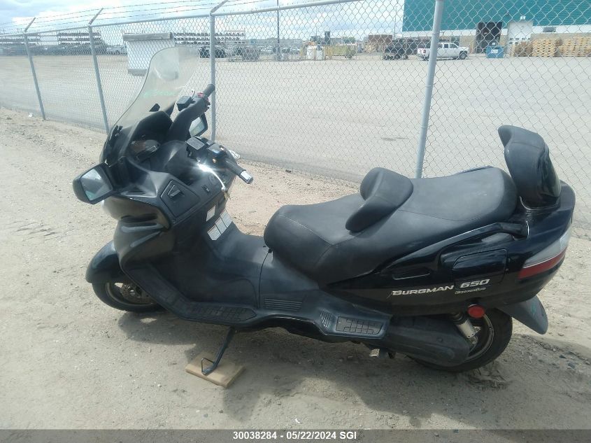 2010 Suzuki An650 A VIN: JS1CP51B9A2100037 Lot: 30038284